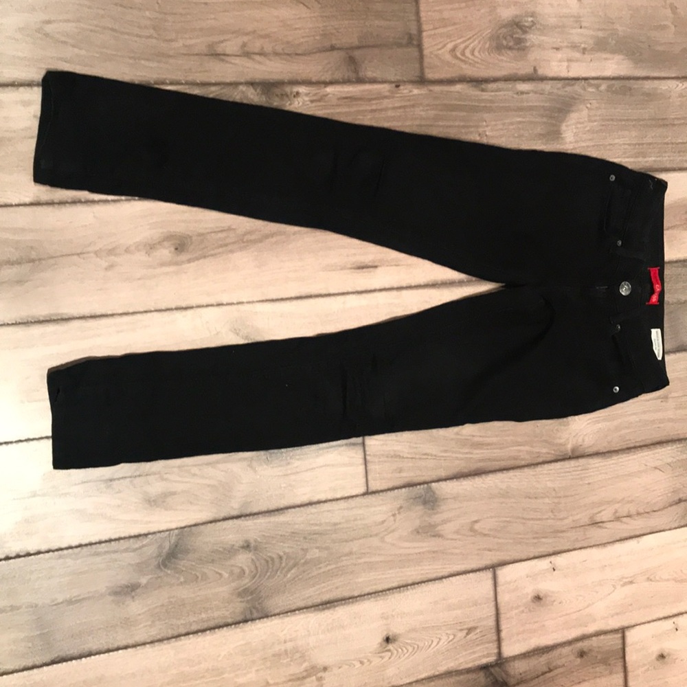 Guess black mid rise skinny jeans